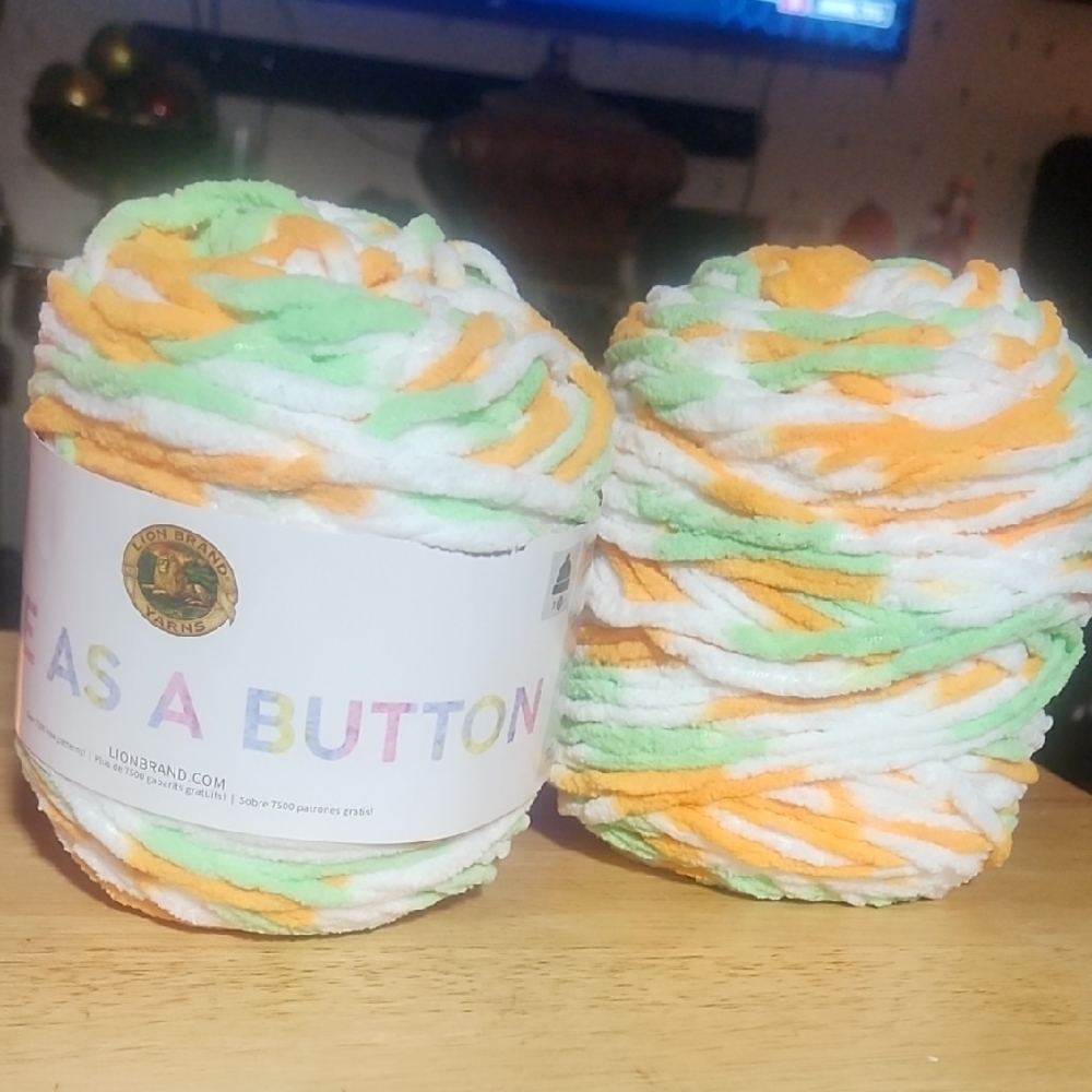 Lion Brand Yarn in Green, Orange, and White